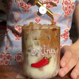 mocha latte with @wearebrightland chili olive oil from their Hill House Set🌶️ it’s 20% off on their website right now!!

#fyp #mochalatte #coffee #latte #chocolatelatte