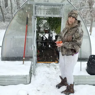 “I love the winter crops. Tomatoes and cucumbers in January; my wife loves it.

I added LED lights to give my winter crops more daylight hours to grow better. I also added a watering system to water e