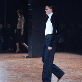 Fall Winter 26 Runway - Look 2

- 

Layered sweater with reverse polo and denim bow jeans.