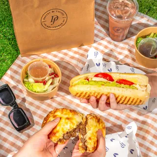 Got picnic plans? Consider them handled 🧺✨⁠
⁠
Grab our NEW grilled sandwiches and head wherever the day takes you. From the creamy Chicken & Guacamole Panini to the rich, melty Smoky Pulled Beef & Che