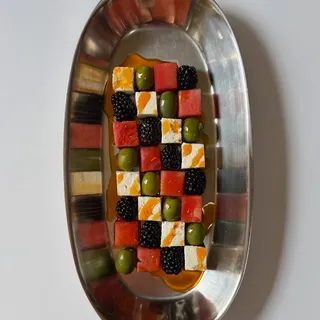 Blackberry, watermelon, feta & olive checkerboard salad on a silver platter, literally! 🫒 Drizzled with Ardor Chili Olive Oil from The Hill House Set for the perfect amount of heat. 🌶️🍉

Take 20% off 