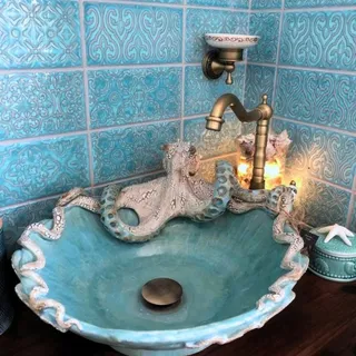 Not your average sink... this octopus-inspired design will definitely make a statement in any space. 🐙✨
.
Would you bring this bold piece into your home? 
.
.
Follow @rove.lab for more design inspirat