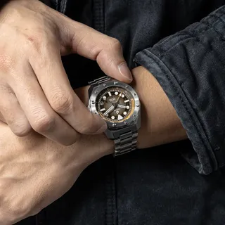 A watch made for the quiet moments that move you forward.⁠
The Odyssey Amber, built with Titanium+, holds strong through land and sea.⁠
⁠
300m water resistance. Flyer GMT for easy travel.⁠
Quick-adjus