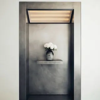 Stainless steel wall at MATIERE PREMIERE flagship on Rue Saint-Honoré.