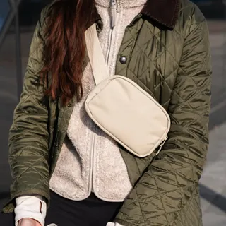 Travel Crossbody Bag now available in Beige and Black. Buy 1 Get 1 today.
