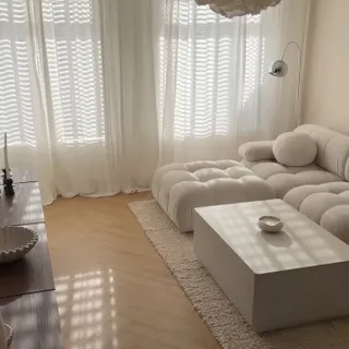 living room ☁️
.
so happy we went with @renovatedirect2 ✨ Our floors never looked better! 🤍 Honey Melba herringbone looks perfect in our minimalist living room, it gives it so much warmth 🕯️👼🏻
.
.
#so
